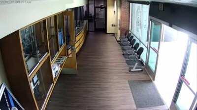 Attacking the police station with a baseball bat