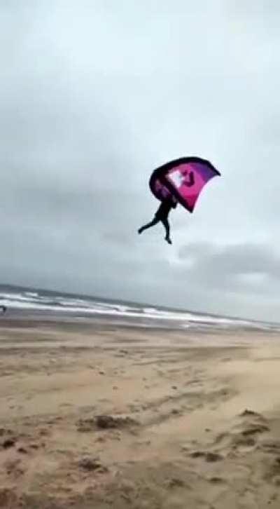 Holding a kite during a storm...