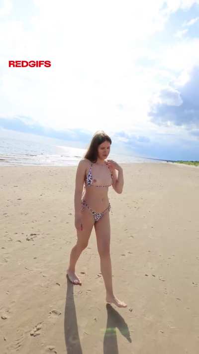 With my perky tits out taking a walk around the public beach