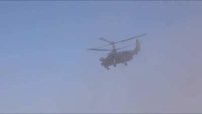 RU POV: The work of a Russian KA-52 Alligator with Mi-28 escort went on the attack, launching a volley of un-guided rockets to UAF positions 