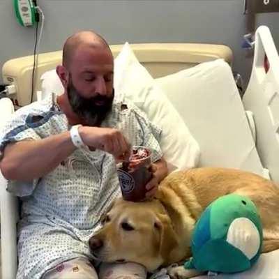 This man was hospitalized and his dog was supporting him at all times