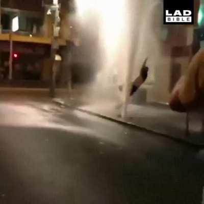 Guy tries playing with water pressure