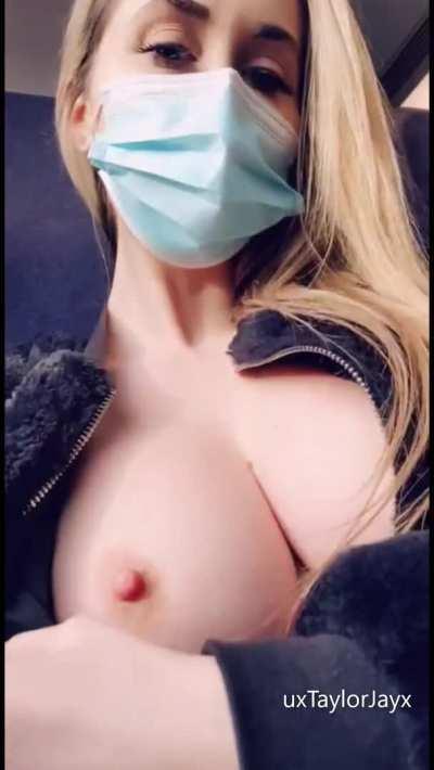 Sitting with my boobs out under my jacket .. It was turning me on thinking he’d catch me