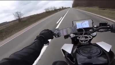 Motorcycle threaded the needle