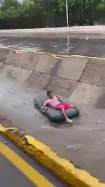 Playing in the rain urban waterslide