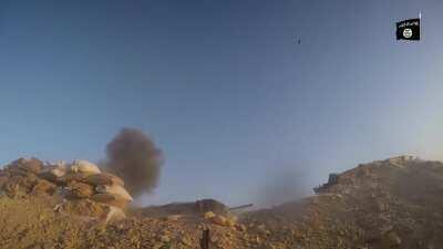 ISIS fighters attacking an Iraqi army barracks