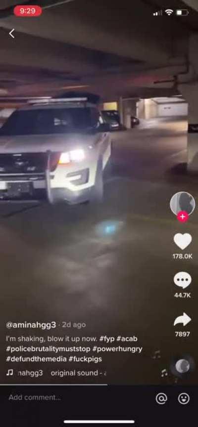 Girl tries to fight a cop. Gets slammed.