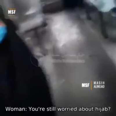 A young iranian girl stands up to a pro-regime woman who calls her 