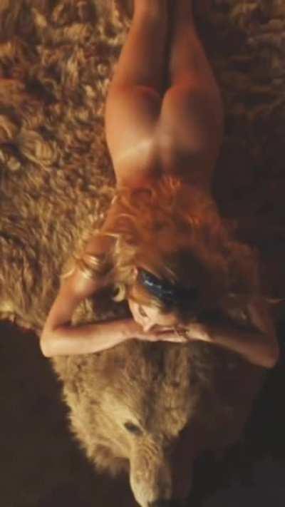 Sydney Sweeney on a bearskin rug