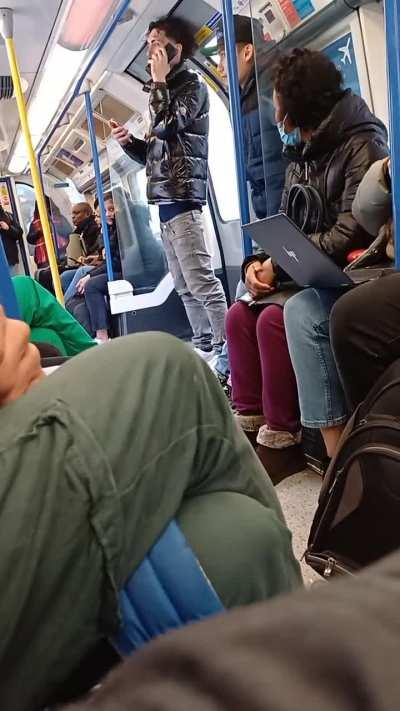 This dipshit who's playing his music through a Bluetooth speaker on the London Underground