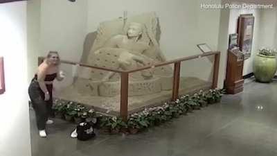 Destroying a sand sculpture