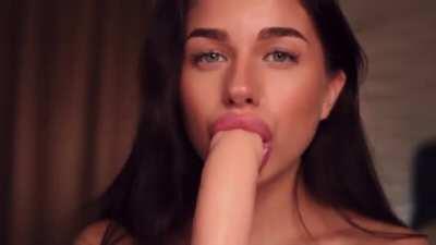 Gorgeous Girl Sucking a Toy