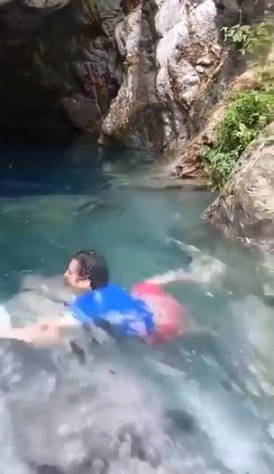 Guy swimming where he shouldn't