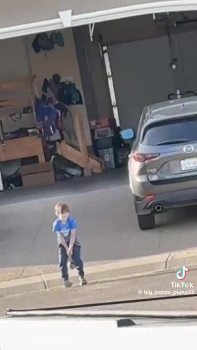 Kid decides to do a bit of field testing on a driver