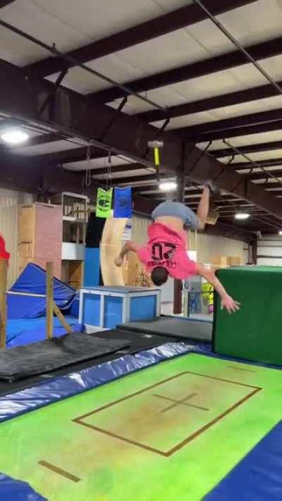 To do a trampoline flip with a hammer