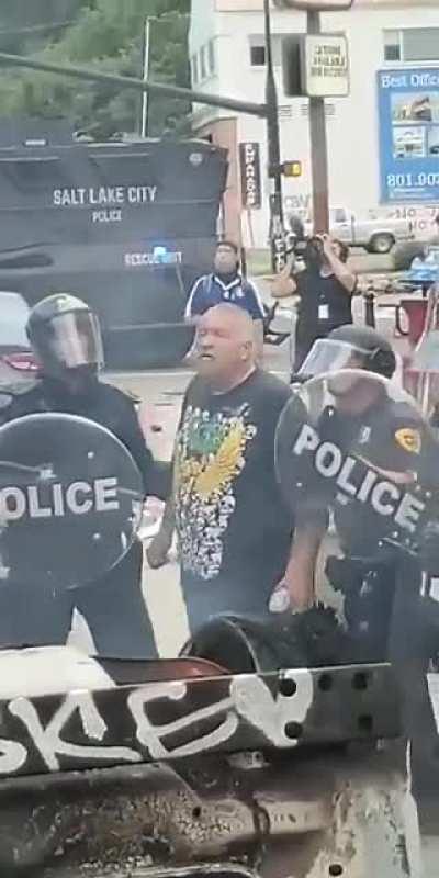 This guy in slc was able to be an instigator against protestors and then slip back behind police lines. They allowed him back and forth, causing problems--then protecting him.