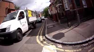 Guy aggressively argues with a cyclist about being in the road, then gets a dose of sweet karma.