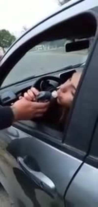 When cop asked the lady to blow in the breathalyzer.