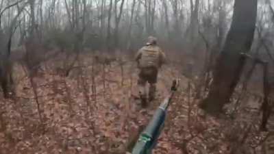 GoPro footage showing Russian troops attacking and capturing an Ukrainian trench, bodies can be seen.