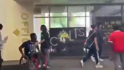 Teen student fights other wheelchair bound student