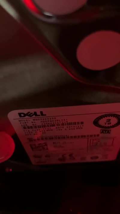 I got 2 2tb dell hard drives from my neighbor for formatting and reuse, but they both do this weird sound