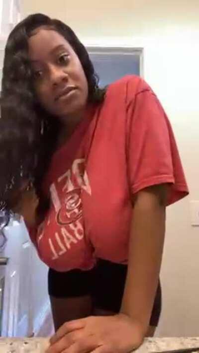 Yani brushing her hair and dancing