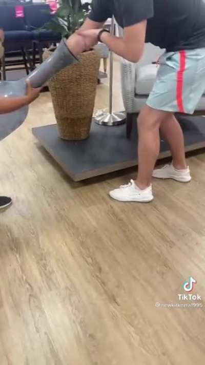 Arm stuck in a vase, and infectious laughter