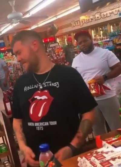 Just some dudes vibing in the checkout line