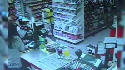 Clerk Grabs Baby from Woman Before She Collapses