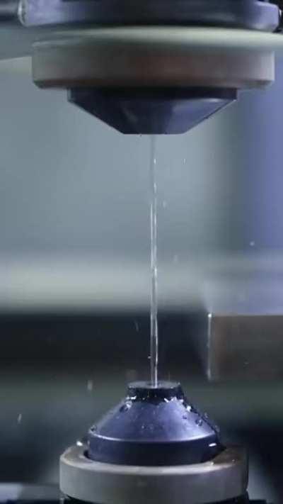 Cubes cut with air tight precision using a CNC cutting process called electrical discharge machining. US Digital