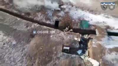 Soldier of the 109th mountain assault battalion storm a Russian position with the coordination and help of a overhead drone