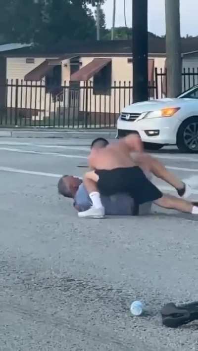 Miami guy leaves car in drive to fight