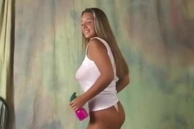 Christina Model - Wet white tank top in yellow thong