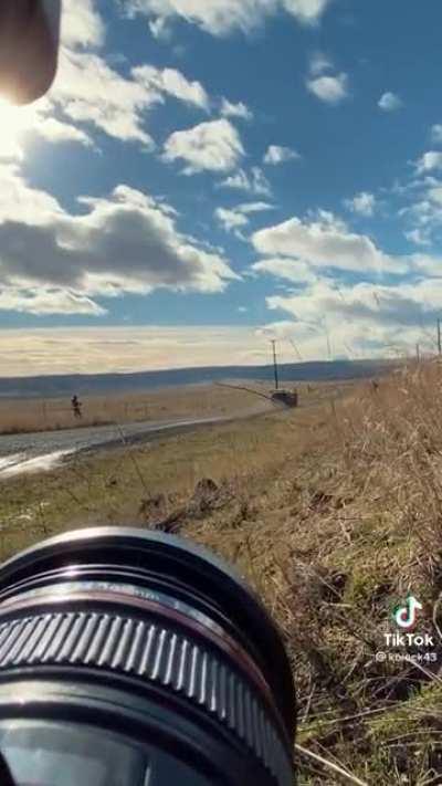 Cameraman taking a huge risk for the shot