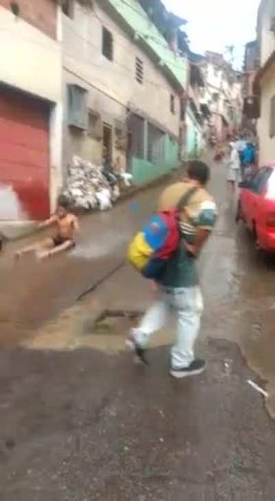 Sliding down a rainy street