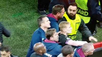 West Ham players clashing with stewards and signaling their families to leave the stands to avoid AZ ultras