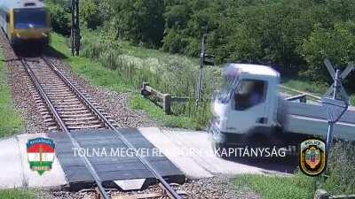 In Hungary, a truck collided with a train. The driver was hospitalized.