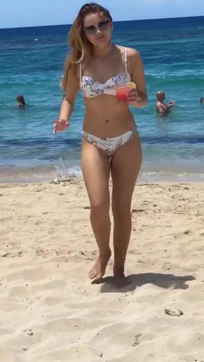 Darling bikini walking on the beach