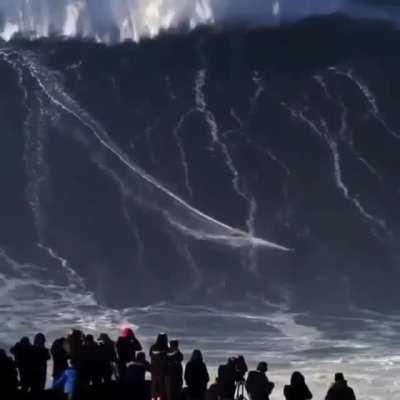 Surfing a huge wave