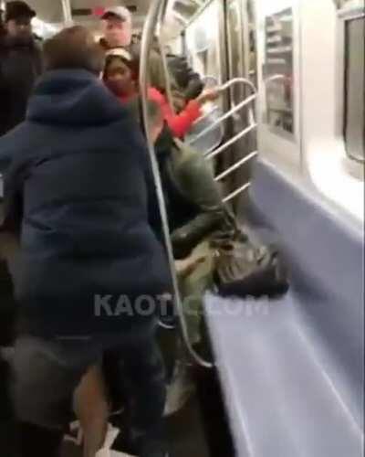 Pit Bull Chomps Woman's Foot in a Subway, Bratty Pit Owner Throws the Woman's Shoe at Another Passenger