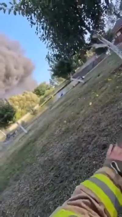 Geran 3 drone flies over Ukrainian firefighter and hits oil storage in double tap strike