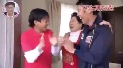 Professional Japanese frisbee thrower throws a pizza from one house to another house's microwave