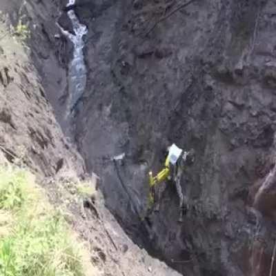 This special excavator for muddy embankments