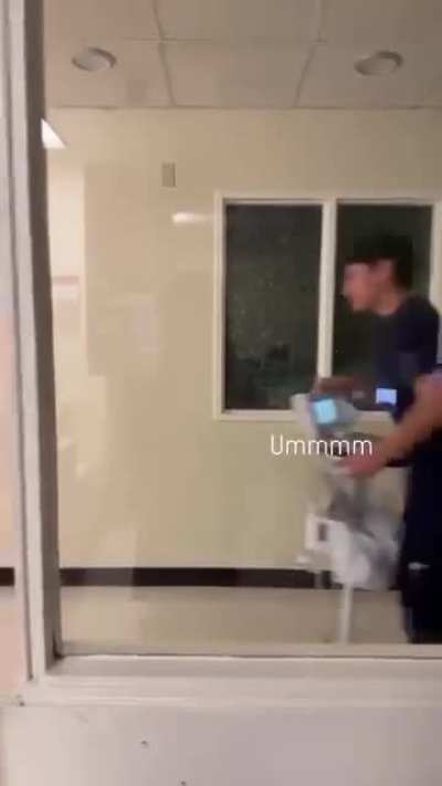 Hospital childlike apparition in window reflection