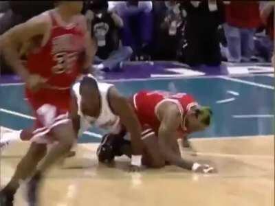 Karl Malone and Dennis Rodman tripping over each other