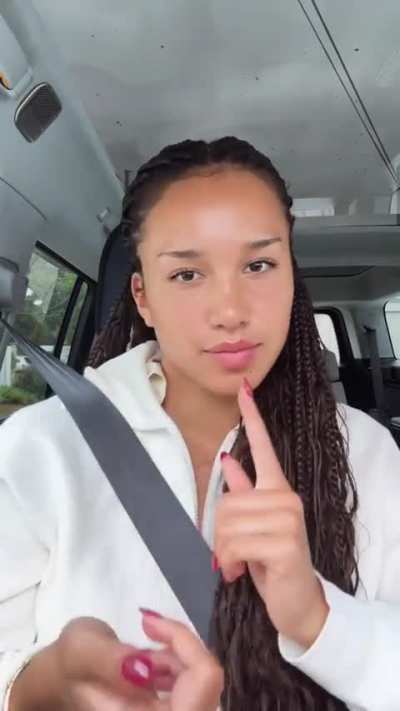 Bored in her car (showing off the new hair)