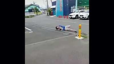 An attempt to jump onto a pole ends badly