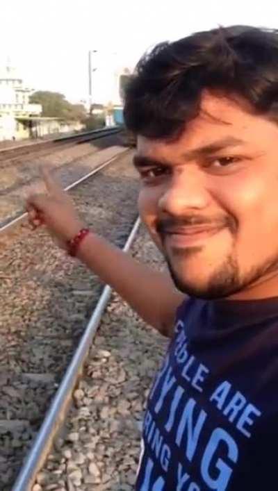 Guy Gets Hit By Train While Taking Selfie