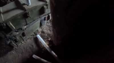 Russian drone gets into an Ukrainian trench but they manage to run out because of late detonation