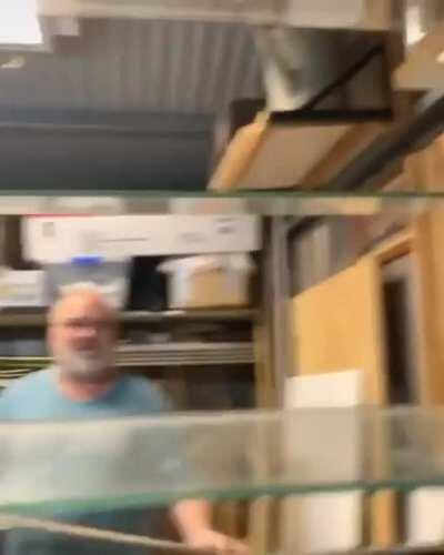 Wife spooks husband through window